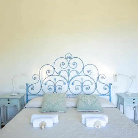 בית נופש Vista Mare Cala Dei Ginepri Con Giardino